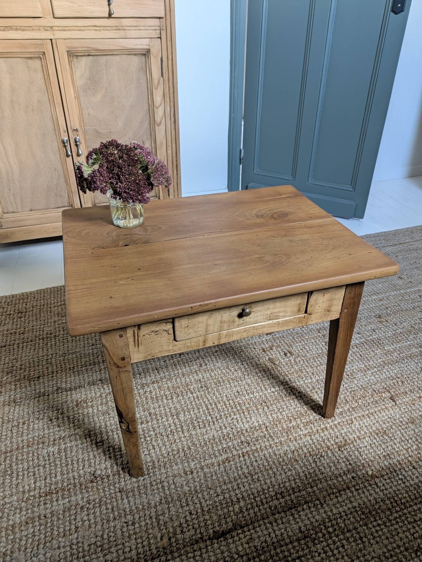 Small antique wooden coffee table with drawer, country style.
