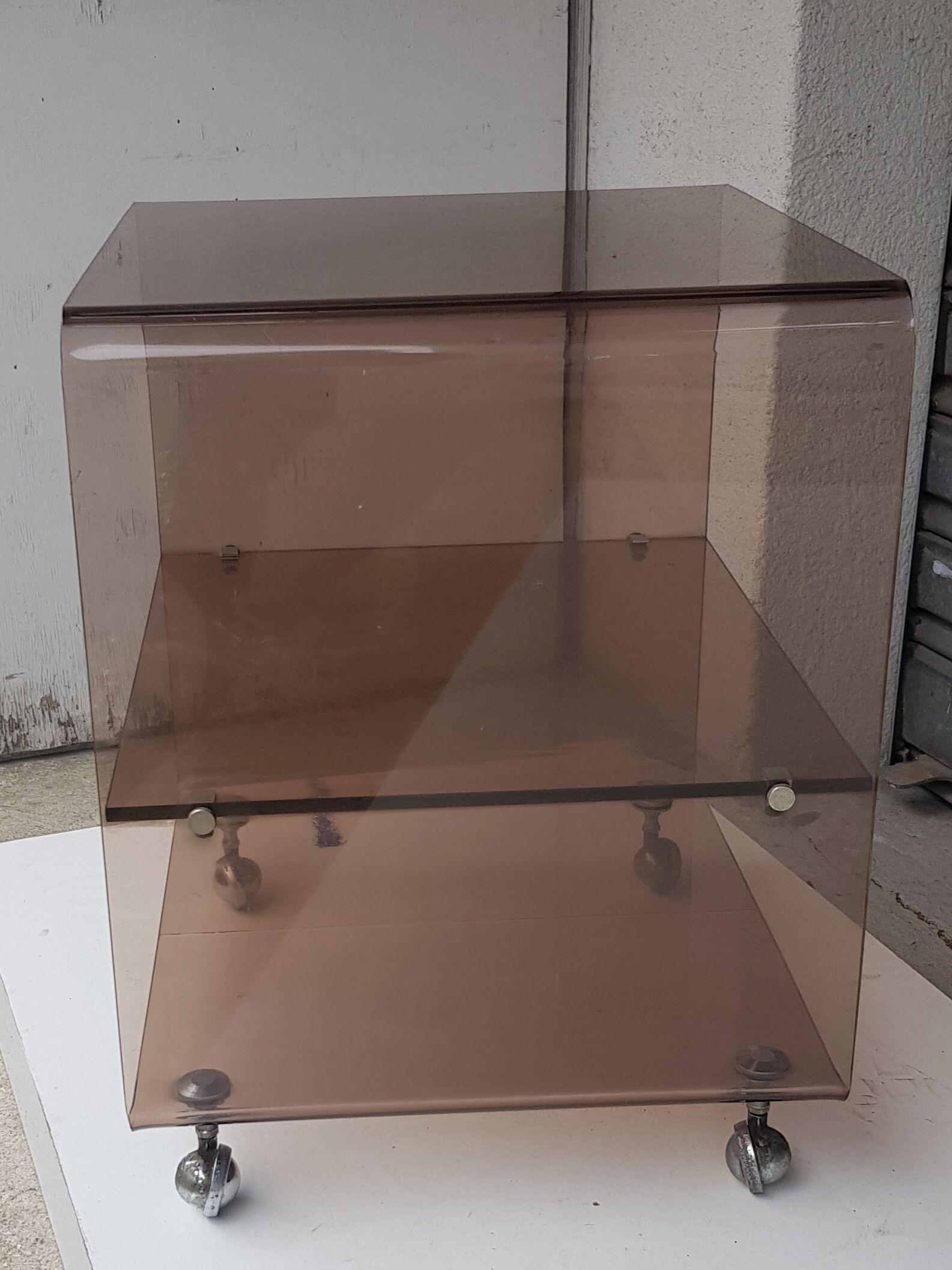 Table serves rolling design in smoked plexi 1970s