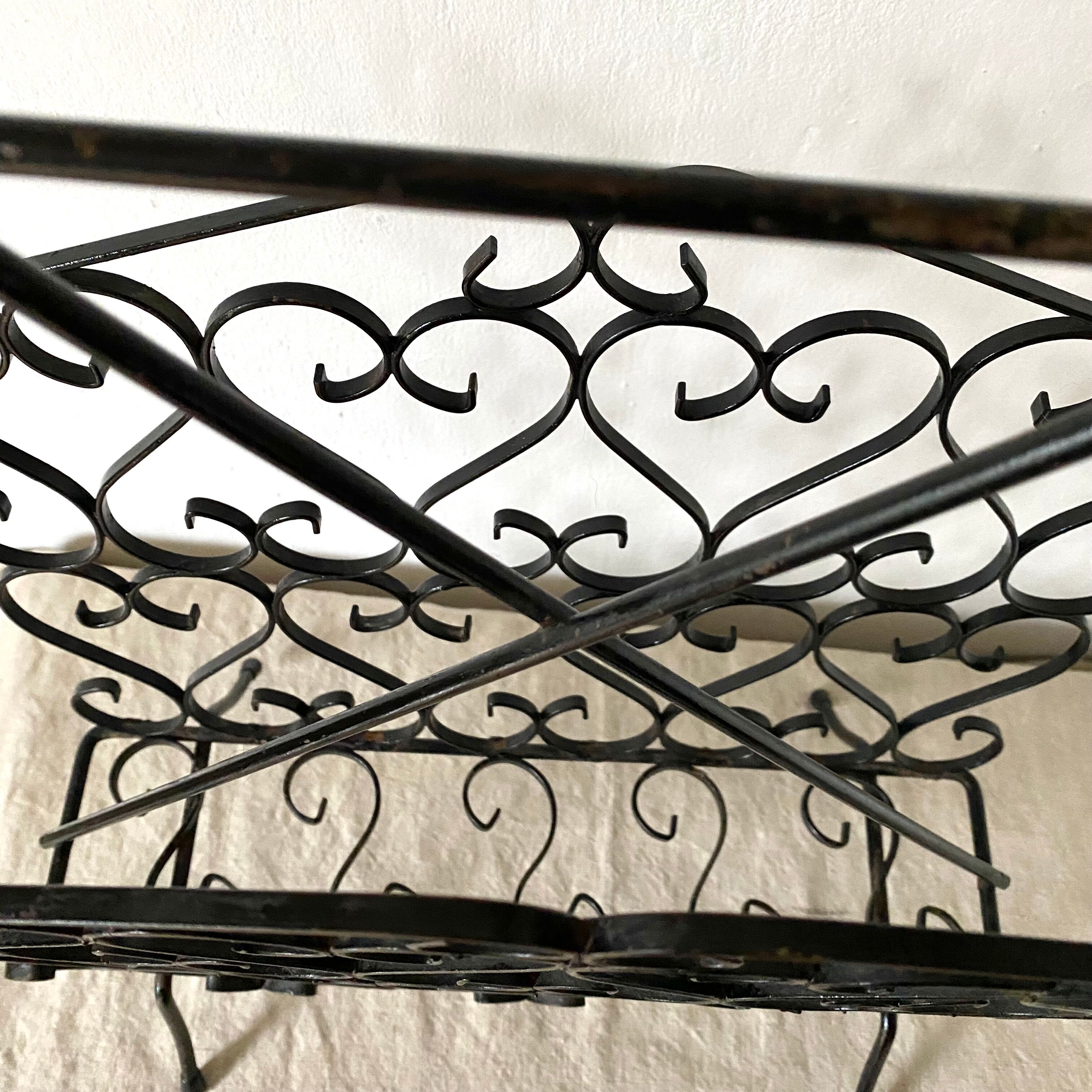 Porte revue en fer forgé années 50