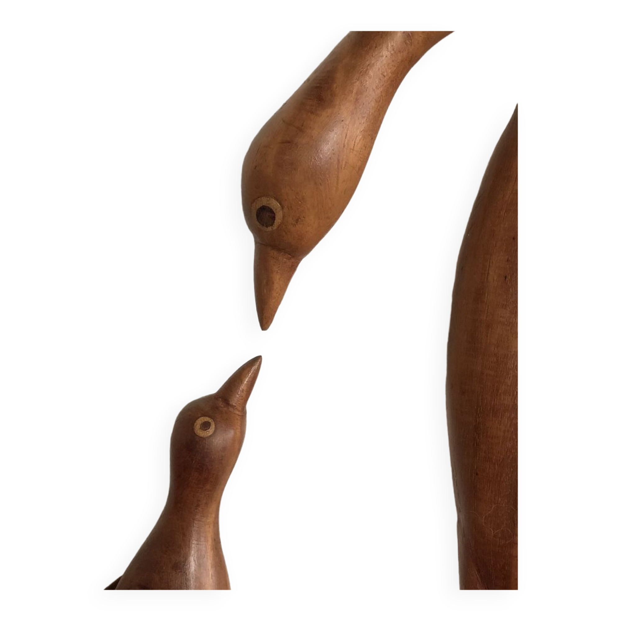 Sculpture of a goose feeding its young