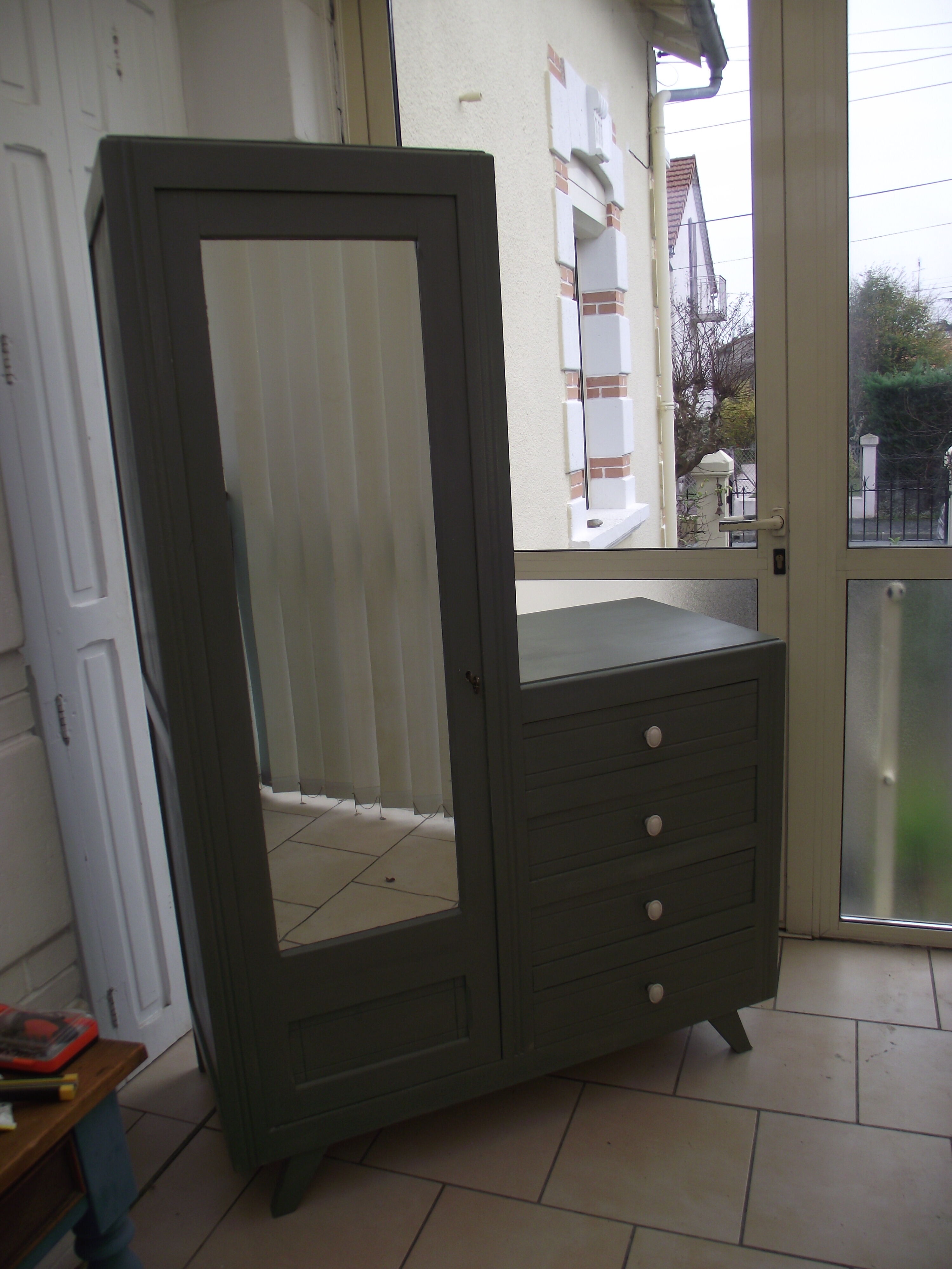 Asymmetrical cabinet from the 50s