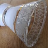 Apply brass swan collar and glass graphic patterns