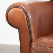 Timeless armchair made of sheepskin leather with a English look