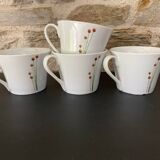 4 fine white porcelain cups with fine flower decoration