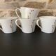 4 fine white porcelain cups with fine flower decoration