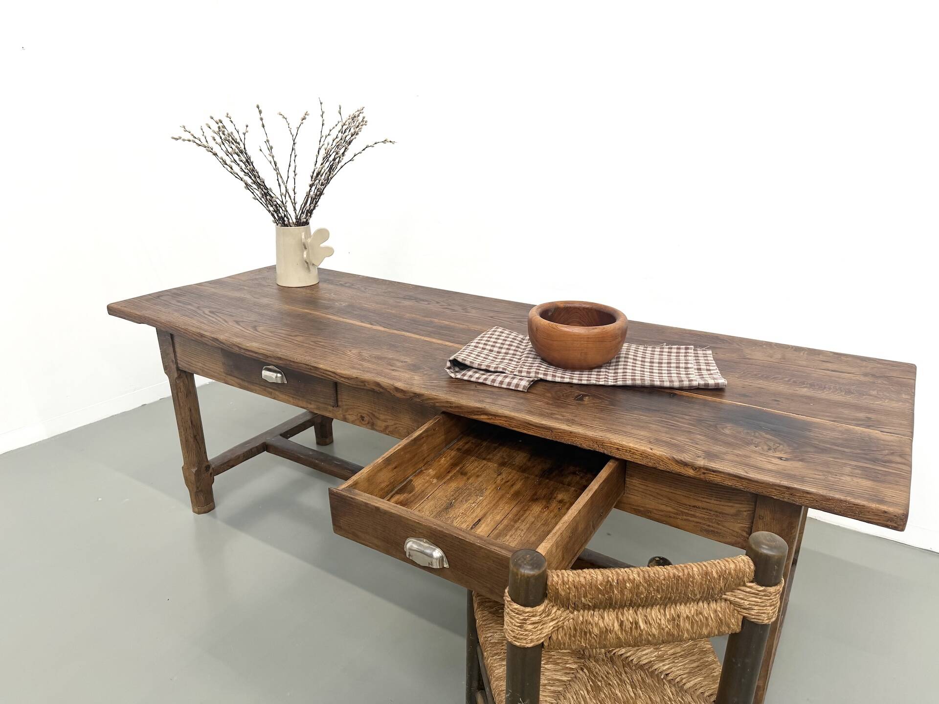 Authentic French farmhouse table from 1890 in solid oak with two drawers.