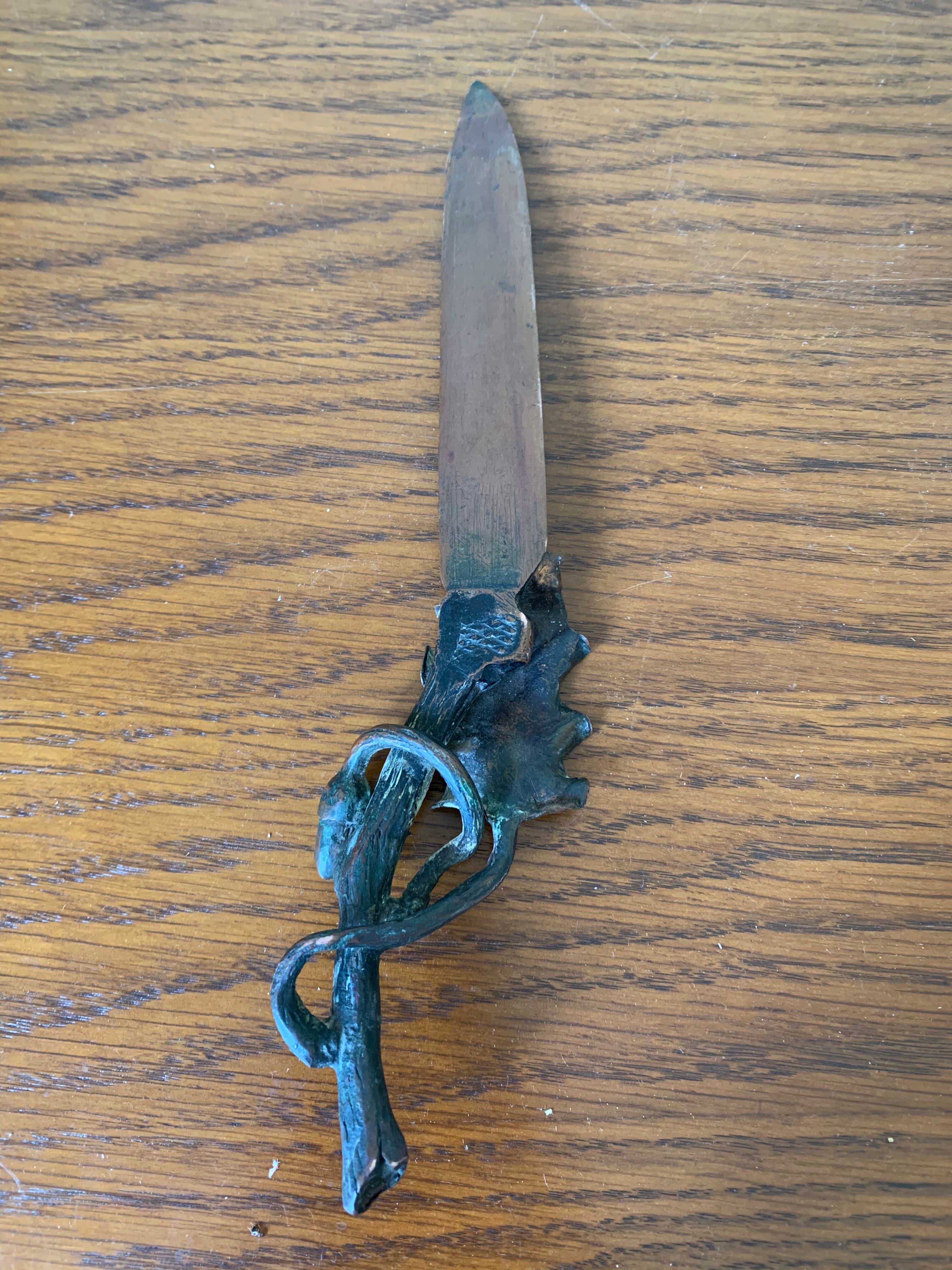 Letter opens, oak leaf