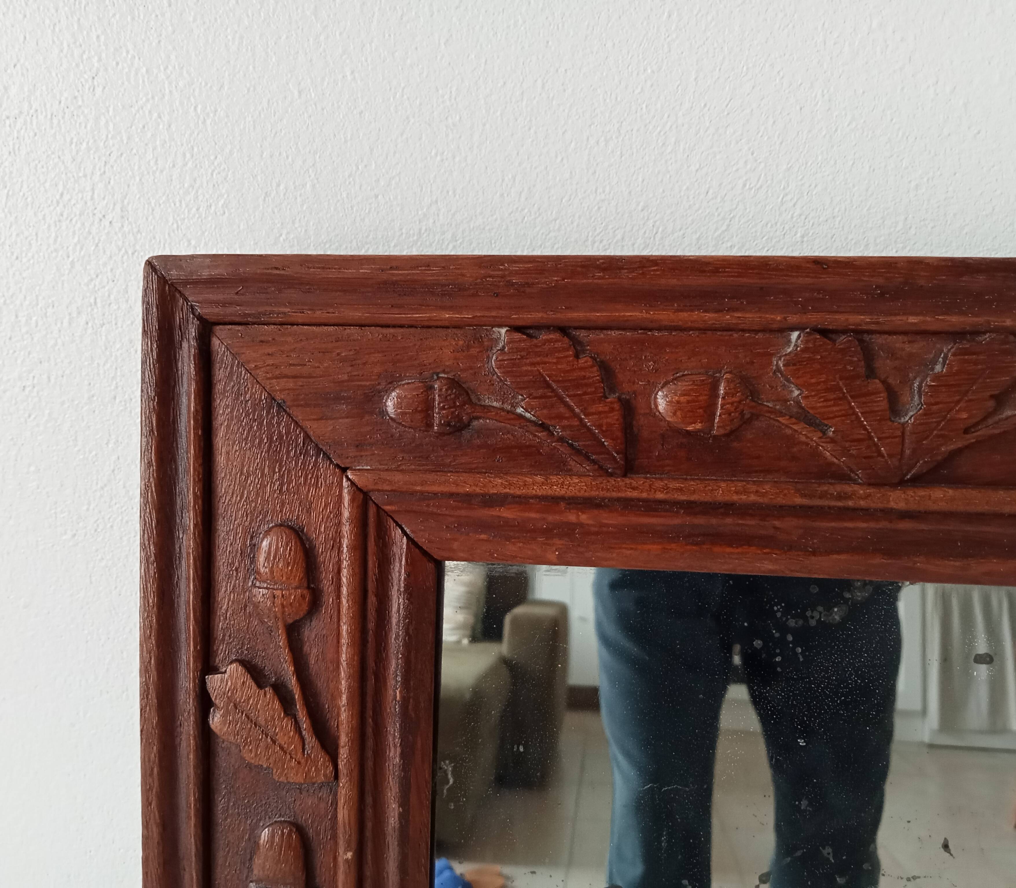 Antique mirror in carved wood