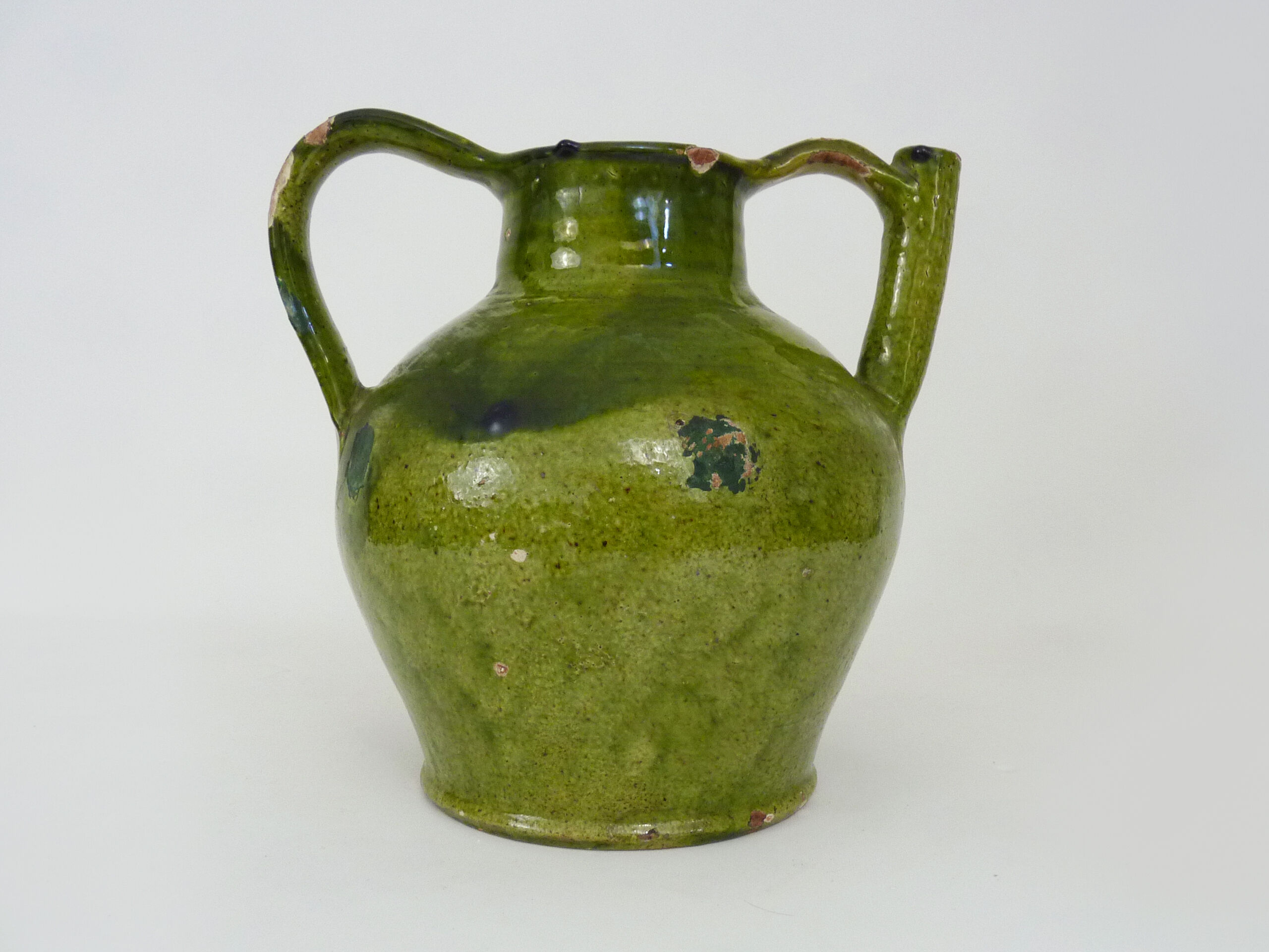 Orjol water pitcher pottery in green glazed terracotta. Pyrenees XIXth