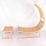Pair of metal and rattan armchairs
