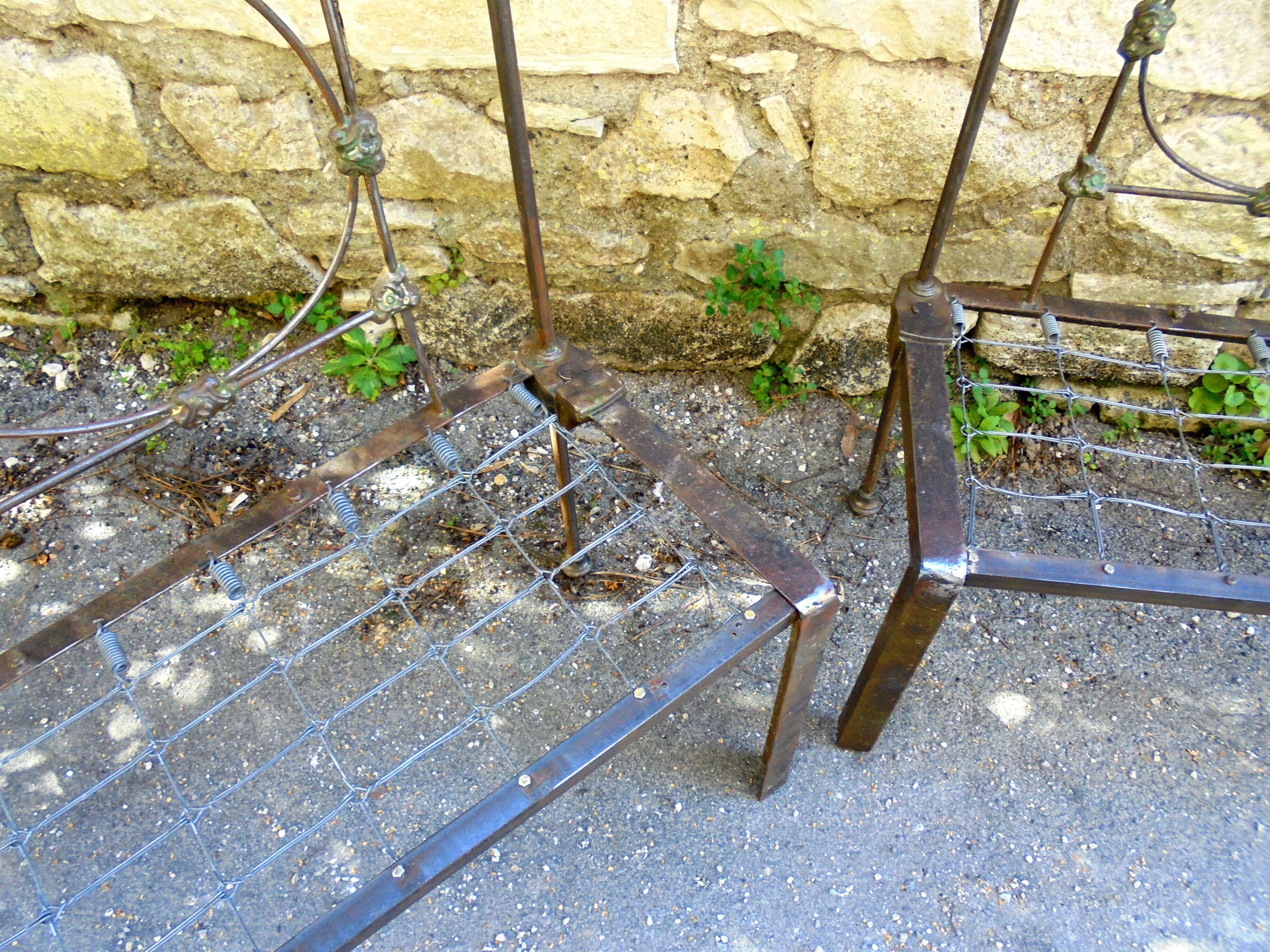 Pair of wrought iron benches