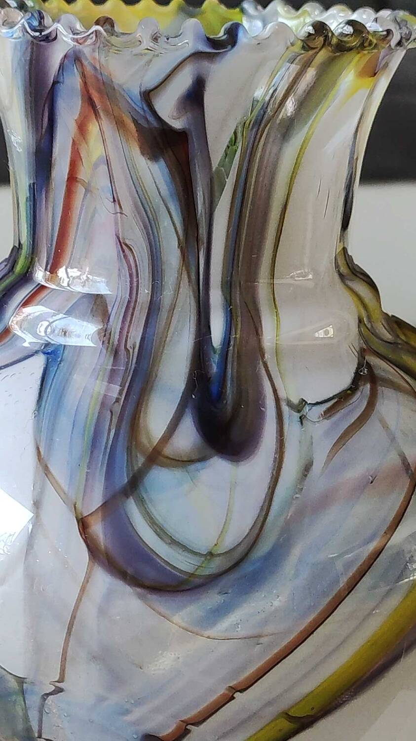Blown Art glass ball vase from Murano/Italy. Decor swirls of smoke/polychrome waves. Dimensions 20 x 15 cm