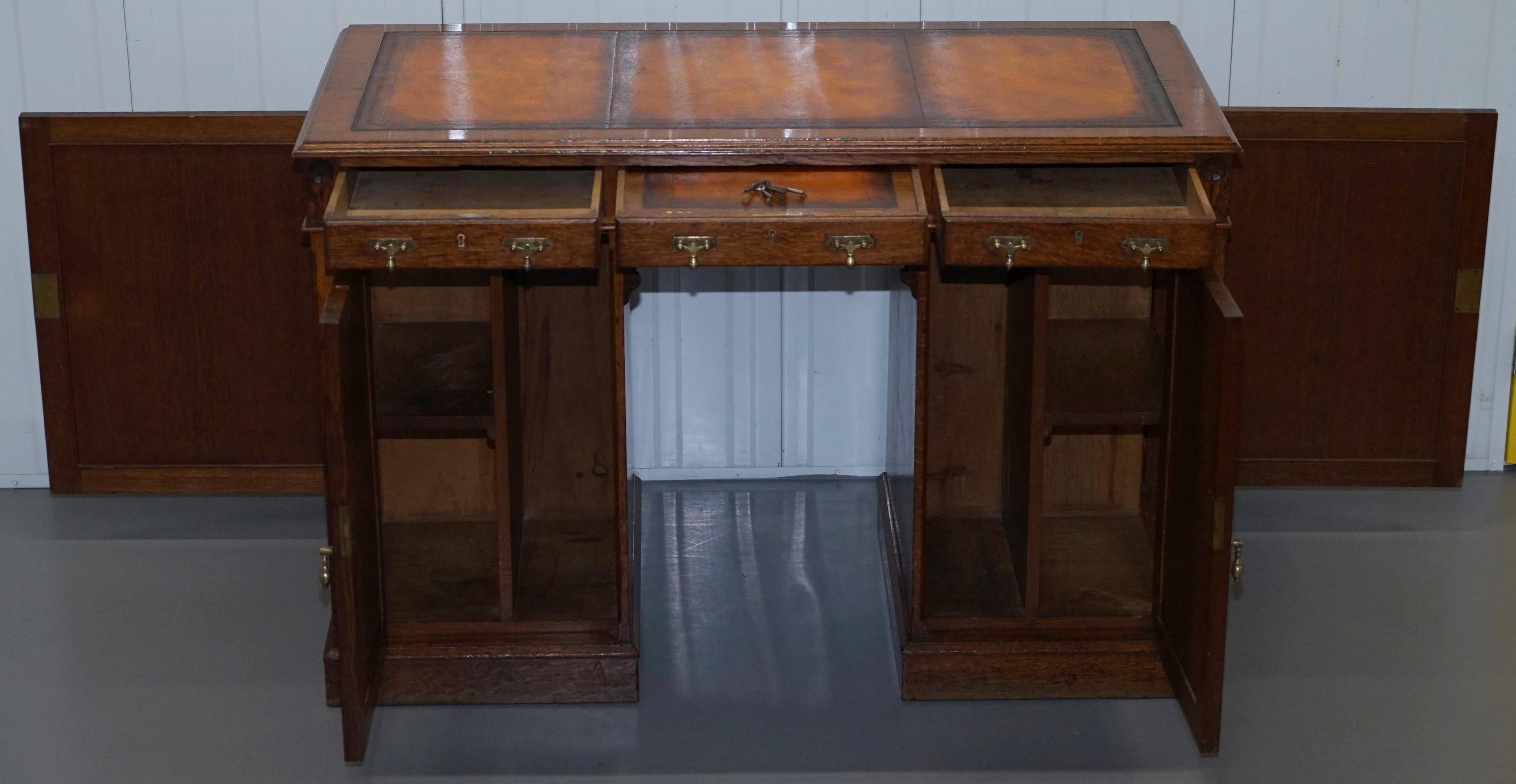 Restored Gothic desk with side bookshelves, drawer, and sloping top by Pugin Gillows.