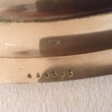 Flat oval silver metal