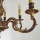 Lustre Art nouveau français en bronze à 6 lumières avec bras en volutes et détails en forme de feuilles