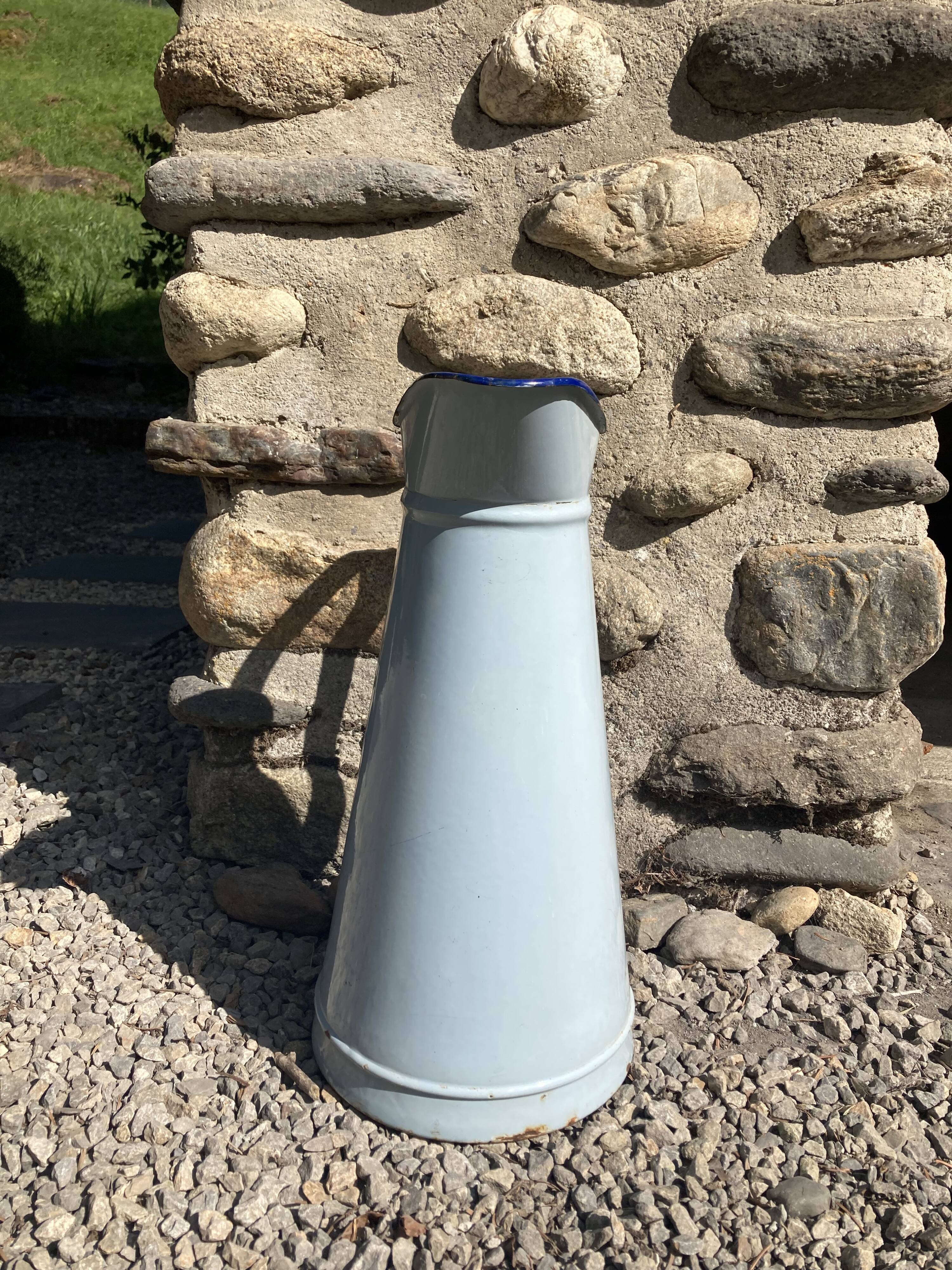 Broc in enamelled blue sheet metal