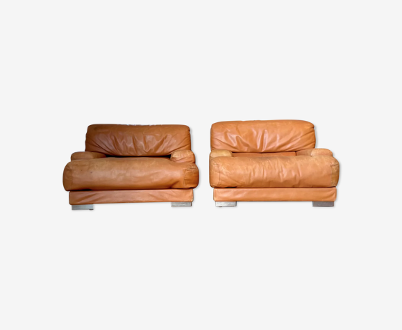 Paire de fauteuils vintage Gérard Guermonprez cuir fauve et inox, France 1970