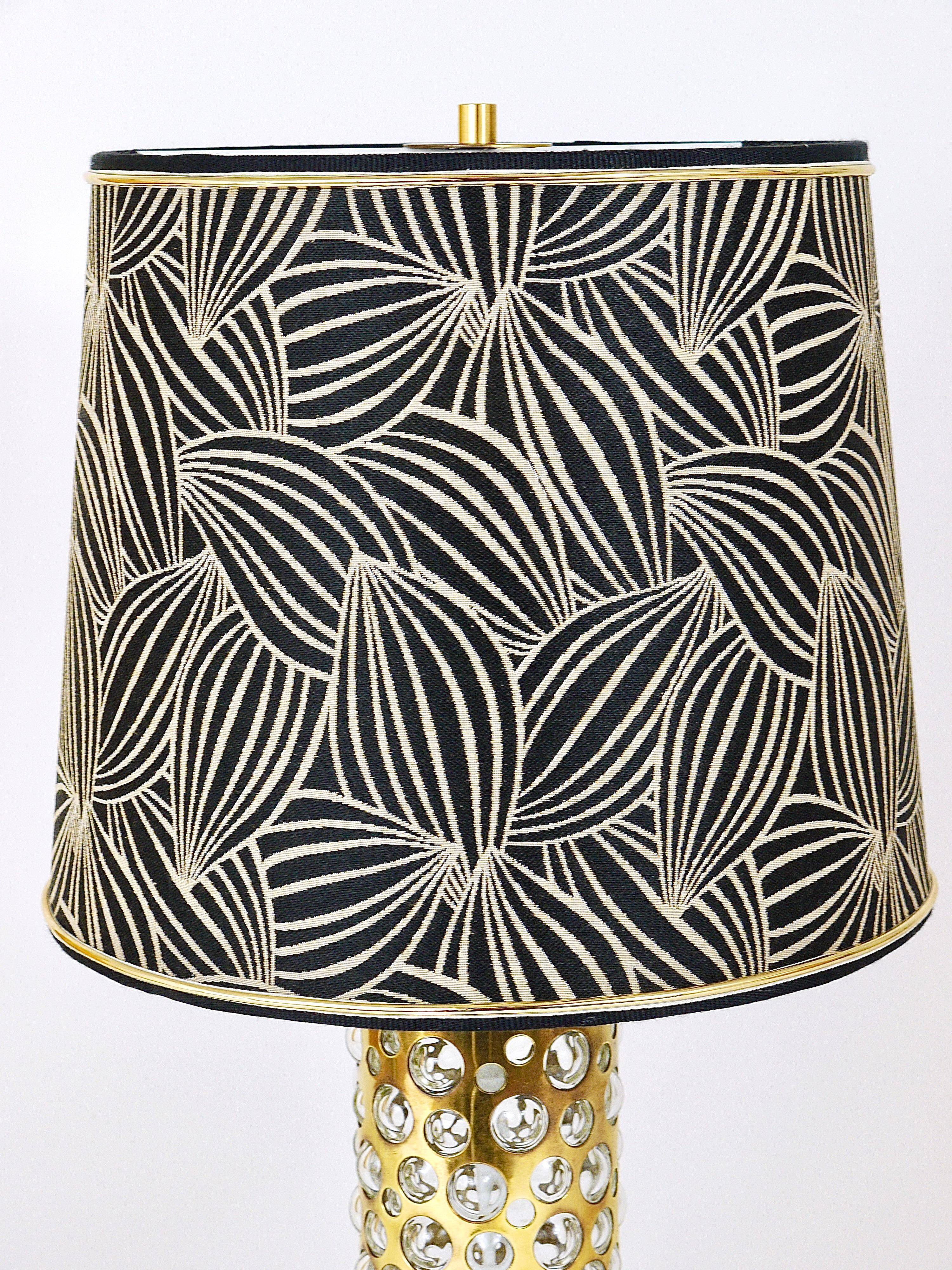 Rupert table lamp by Nikoll mid-century in brass tube and bubble glass, Austria, 1950s.