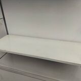 Metal string shelf