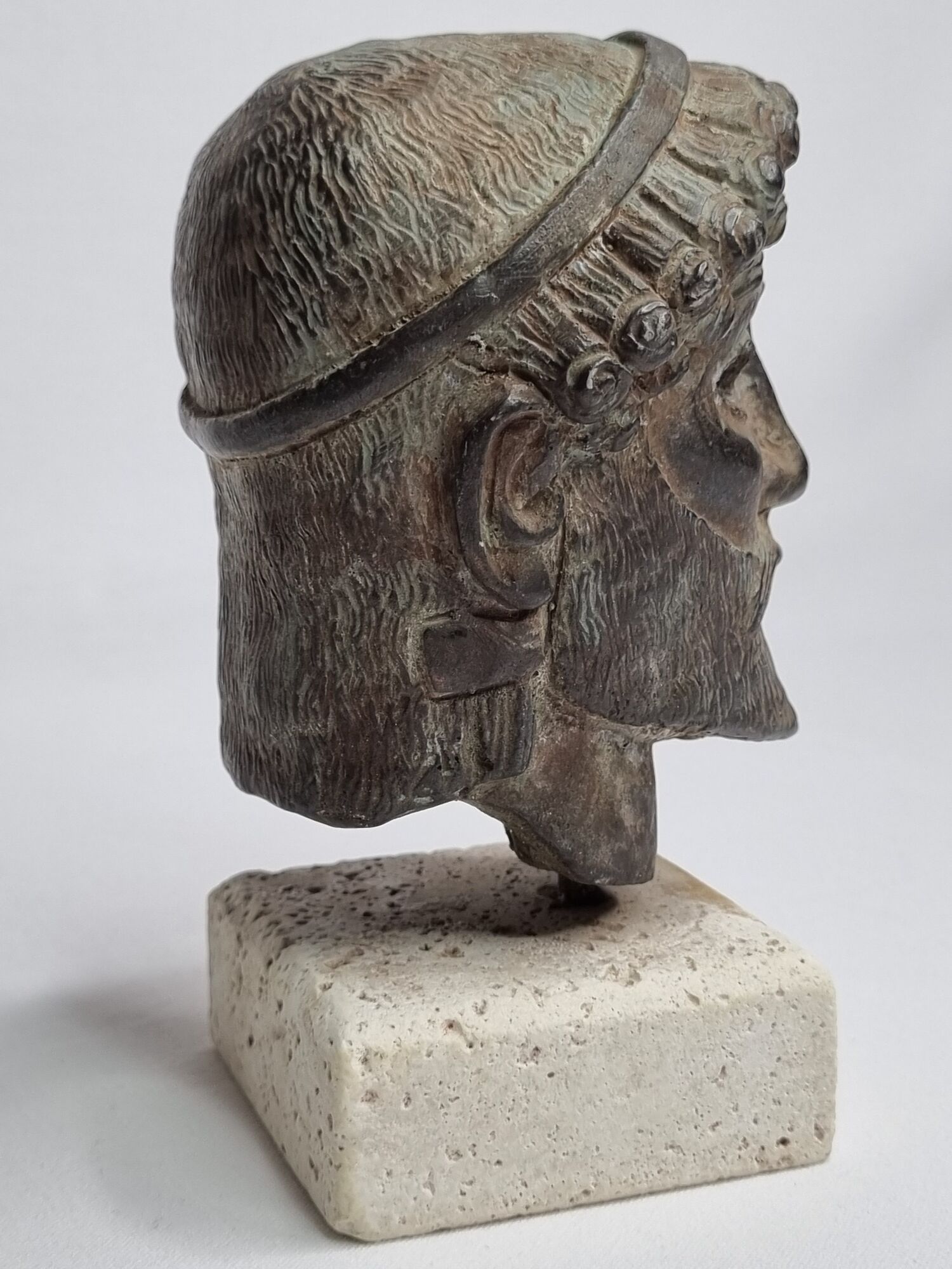 Head of Zeus in patinated plaster in imitation of bronze, 15 cm
