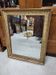 19th century gilt mirror with flowers and foliage decor