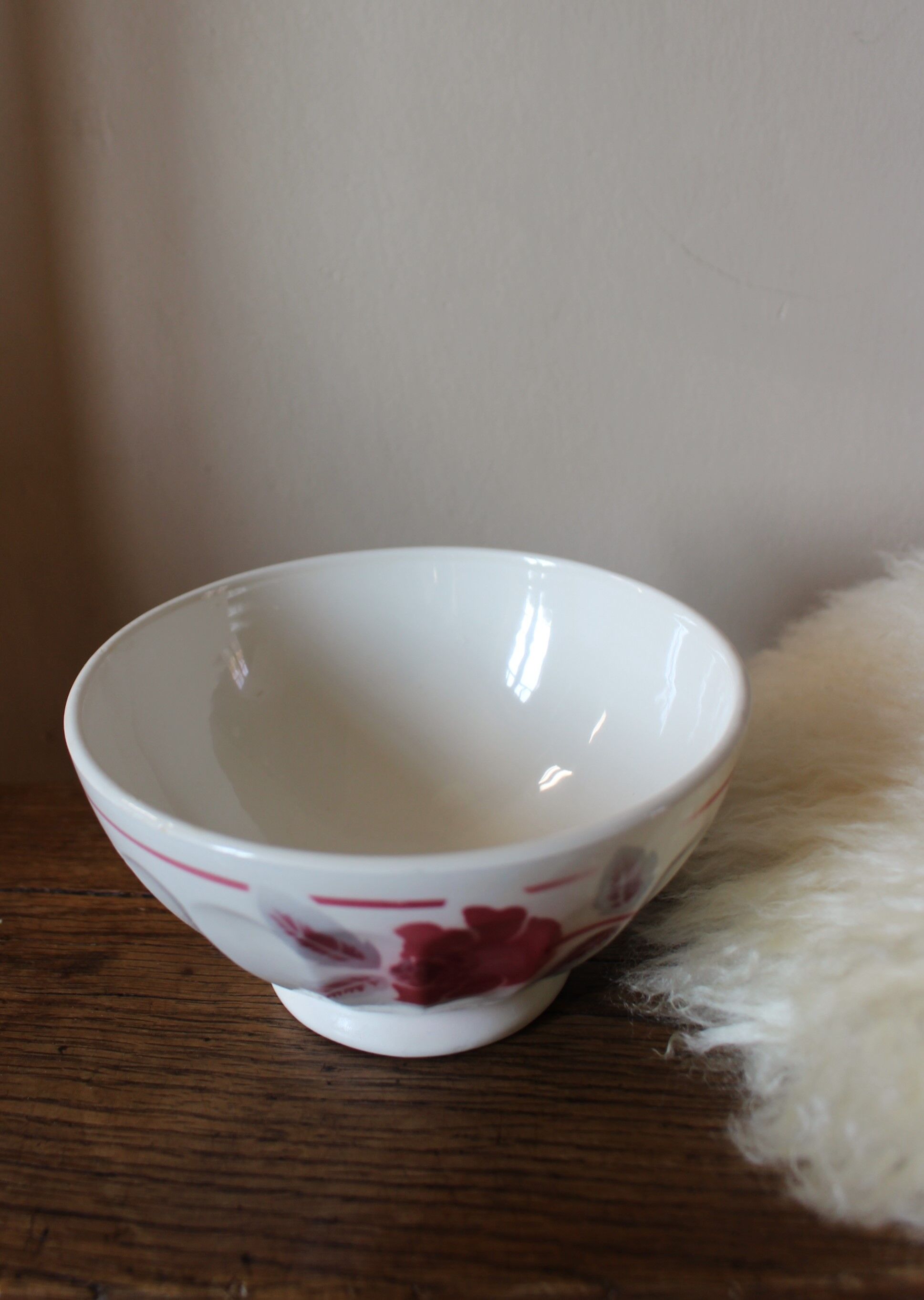 Old standing bowl pink red blue foliage