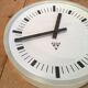 Grey industrial bakelite office wall clock from Pragotron, 1970