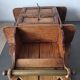 Small antique wall shelf with a drawer in light solid wood.