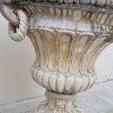 Pair of planter vases decorated with faces in reconstituted stone 1950s