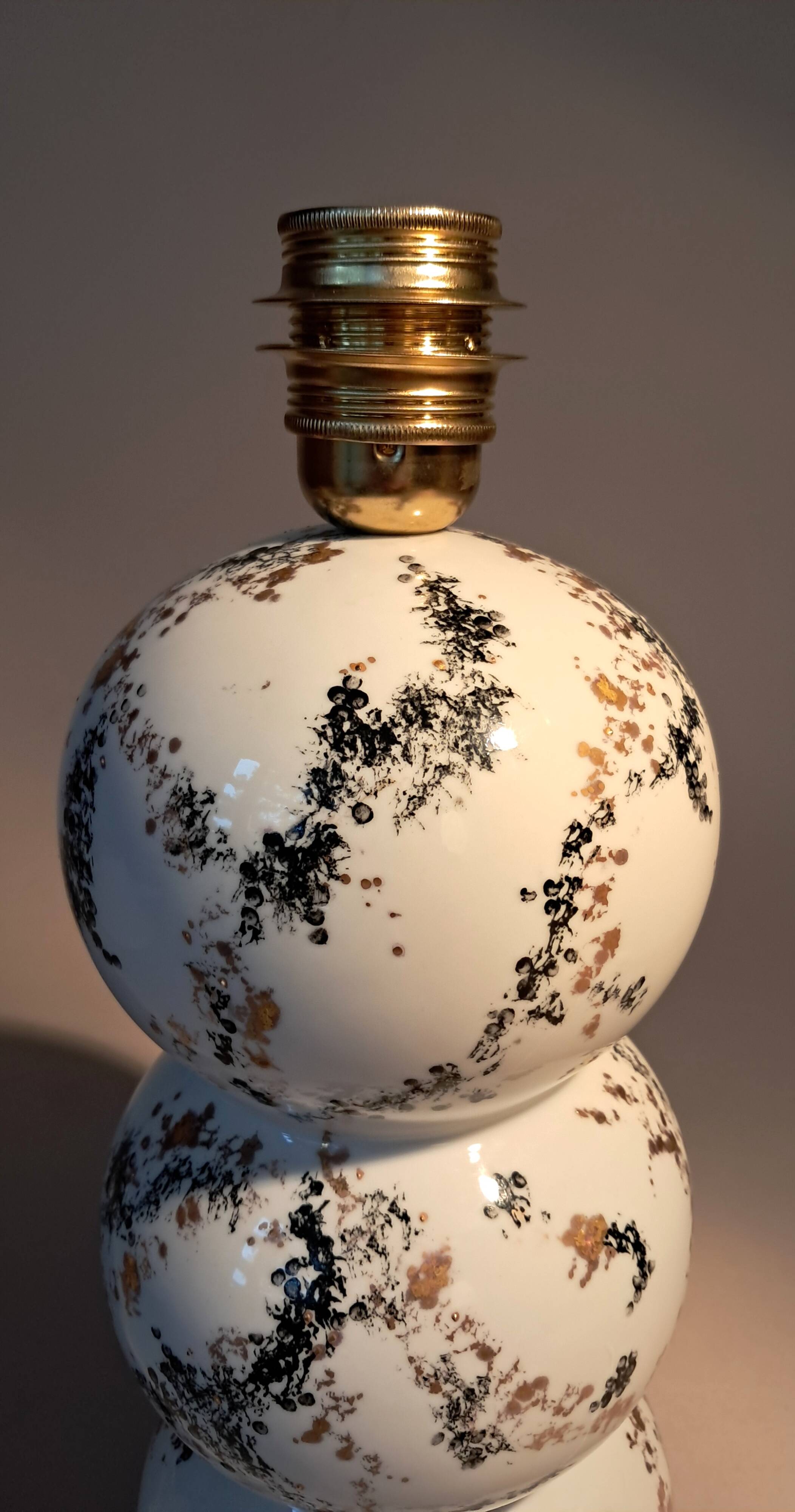 Fine porcelain lamp painted and gilded with fine gold. Laure Selignac, Paris.