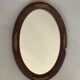 Old stitched oval mirror, 53x37 cm