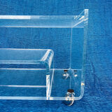 Translucent plexiglass storage drawer/cabinet on wheels.