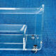 Translucent plexiglass storage drawer/cabinet on wheels.