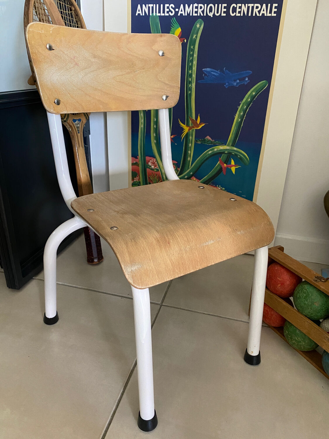 Old wooden and metal children's school chair