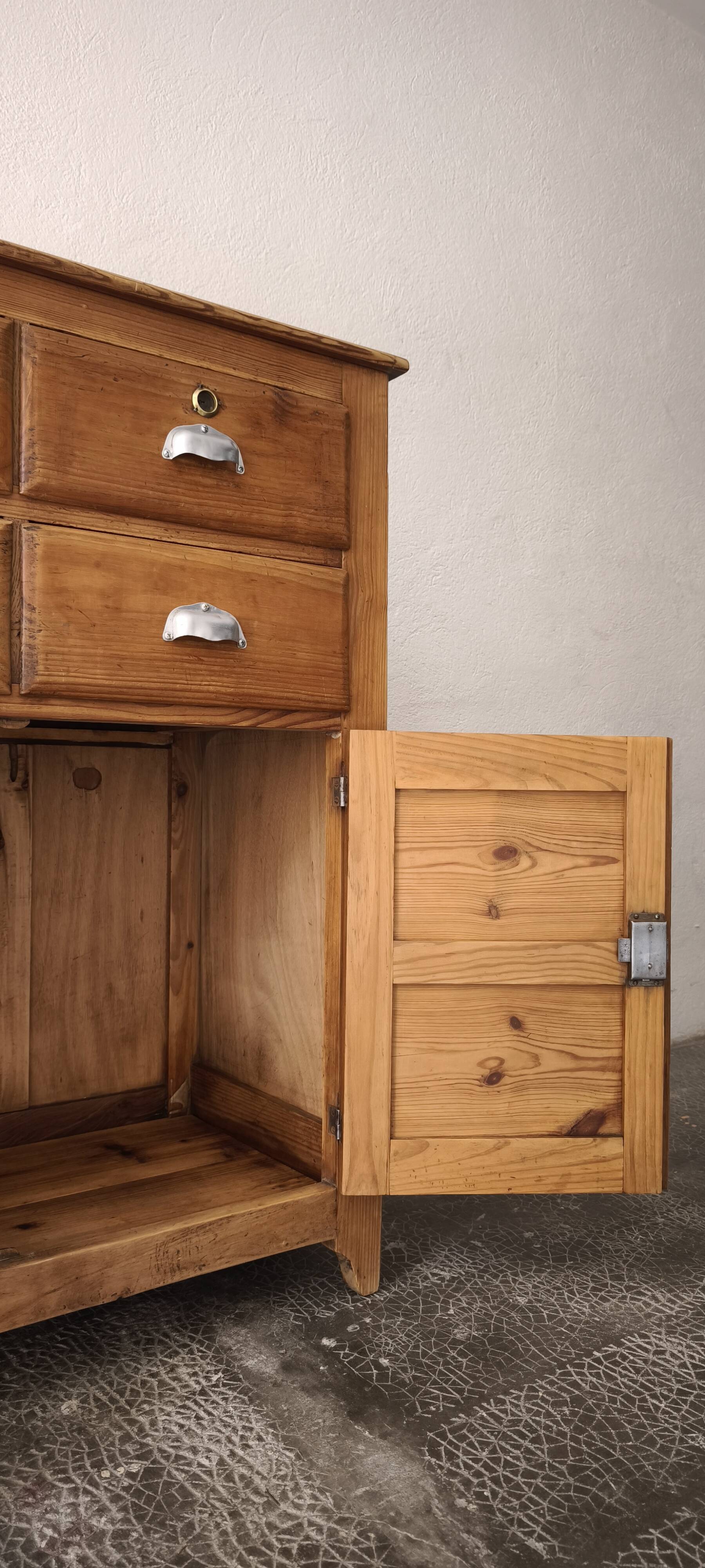 Small antique workshop furniture made of solid wood.