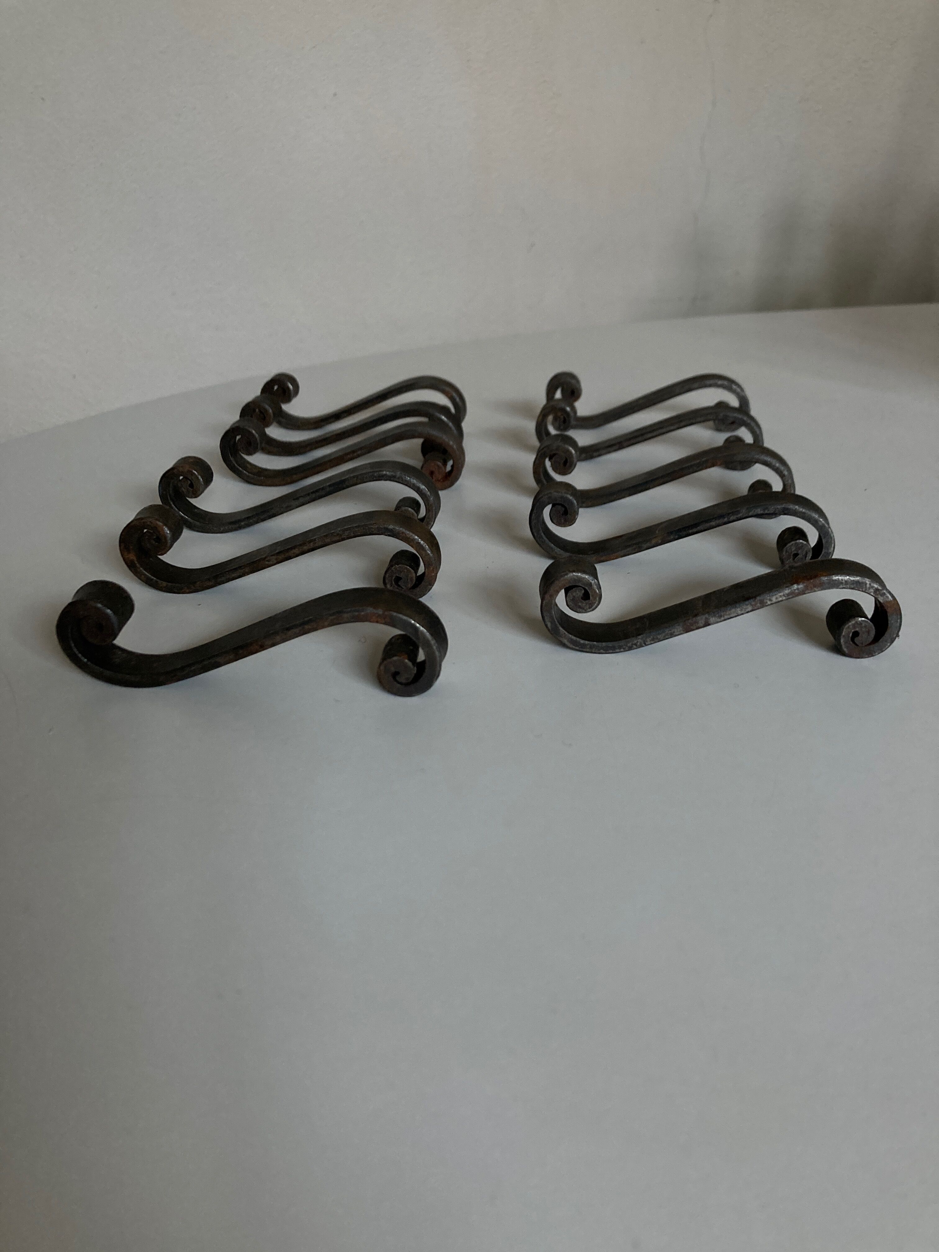 Set of 11 knife holders in beaten iron Provence 1950