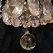 Chandelier in crystal and gilded bronze