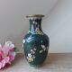 Vintage cloisonné green chinese vase with flower and bird pattern
