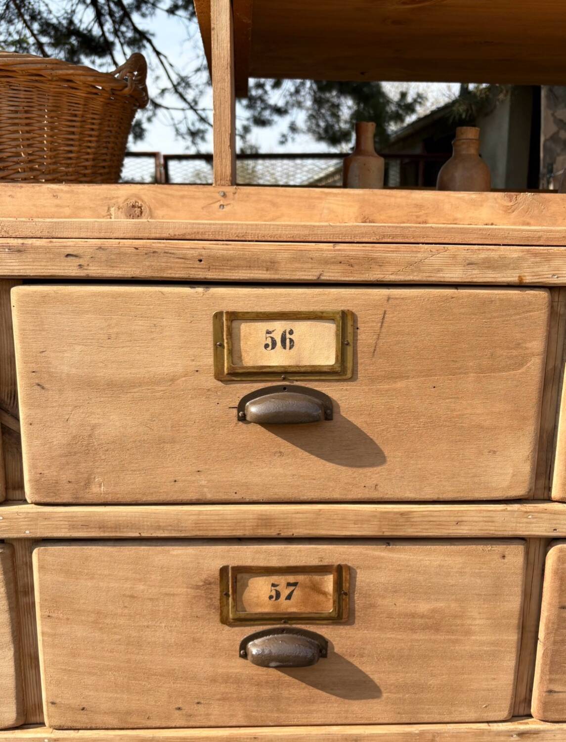 Large antique workshop furniture with drawers and shelves.