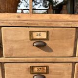 Large antique workshop furniture with drawers and shelves.
