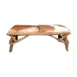 Wooden bench and goatskin