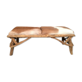 Wooden bench and goatskin