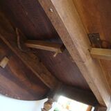 Mid-19th-century walnut round table with shutters, flaps