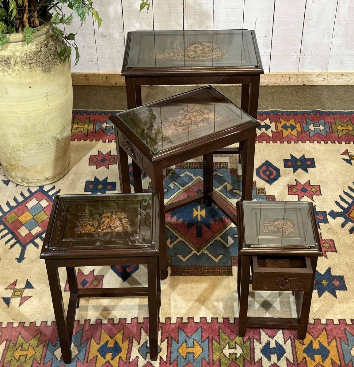 Set of 4 Chinese nesting tables in teak from the 1980s.