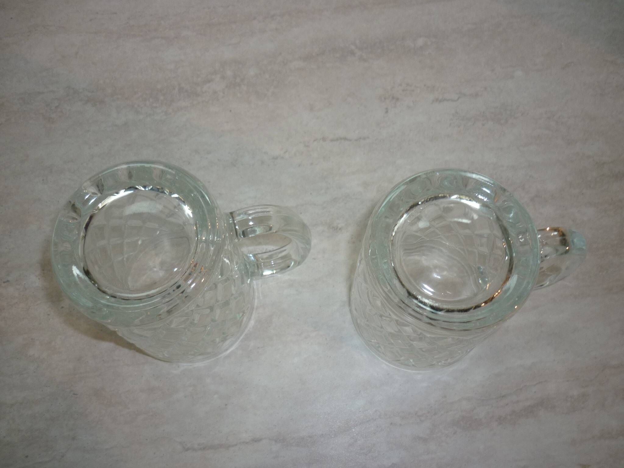 2 diamond-shaped glass beer mugs/glasses