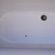 Old rounded emailed bathtub