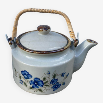 Chinese ceramic and rattan teapot