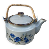 Chinese ceramic and rattan teapot