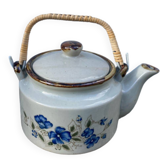 Chinese ceramic and rattan teapot