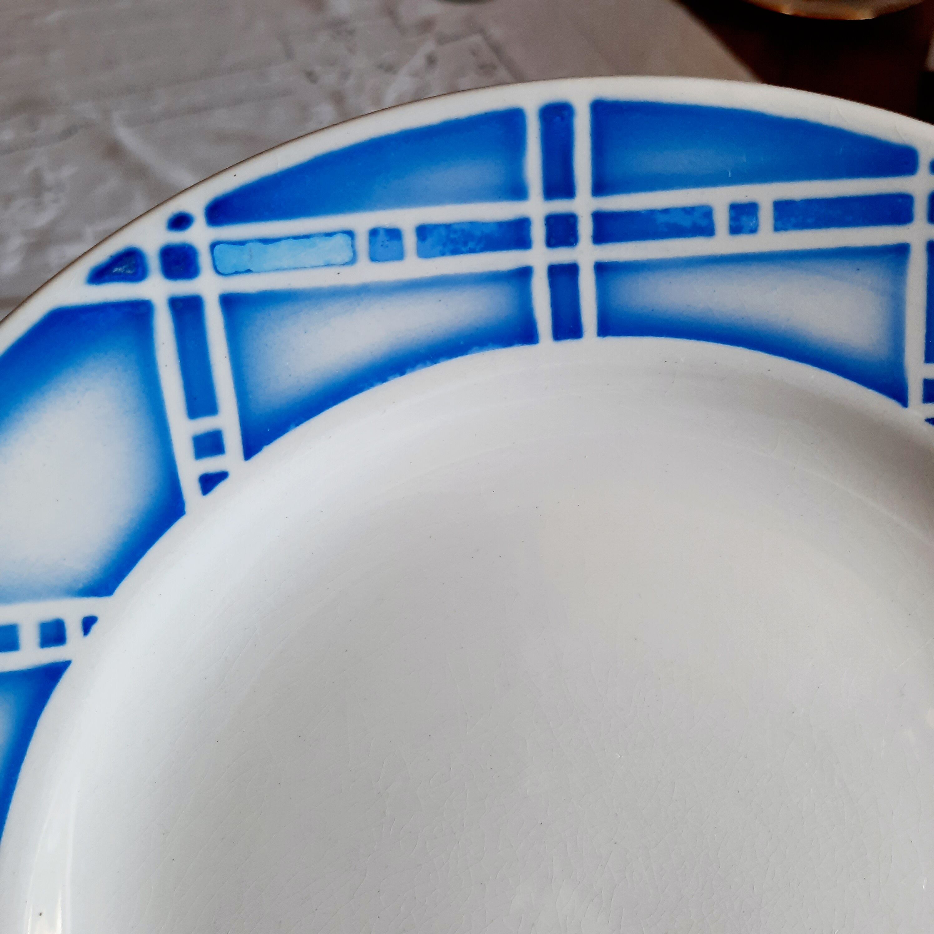 Old flat plates mismatched in earthenware